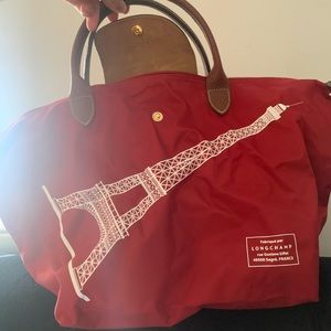Longchamp mini top handle bag.